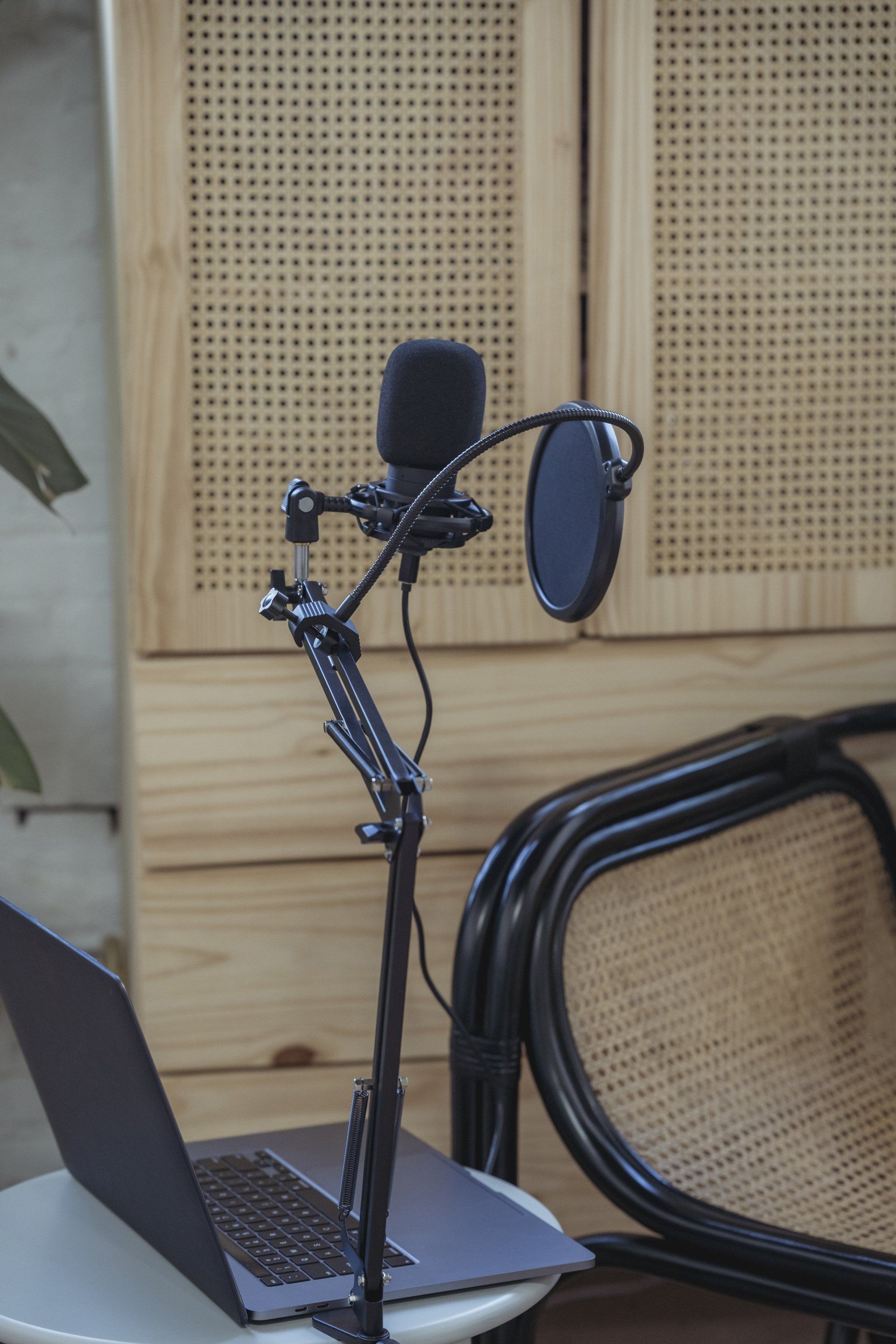 Podcast microphone and laptop set up for a Table Talk recording